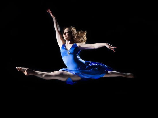 Photographer captures dancer's leap in studio
